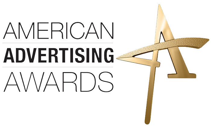 Edyta Jordan receives a Gold Addy Award from American Advertising Federation.